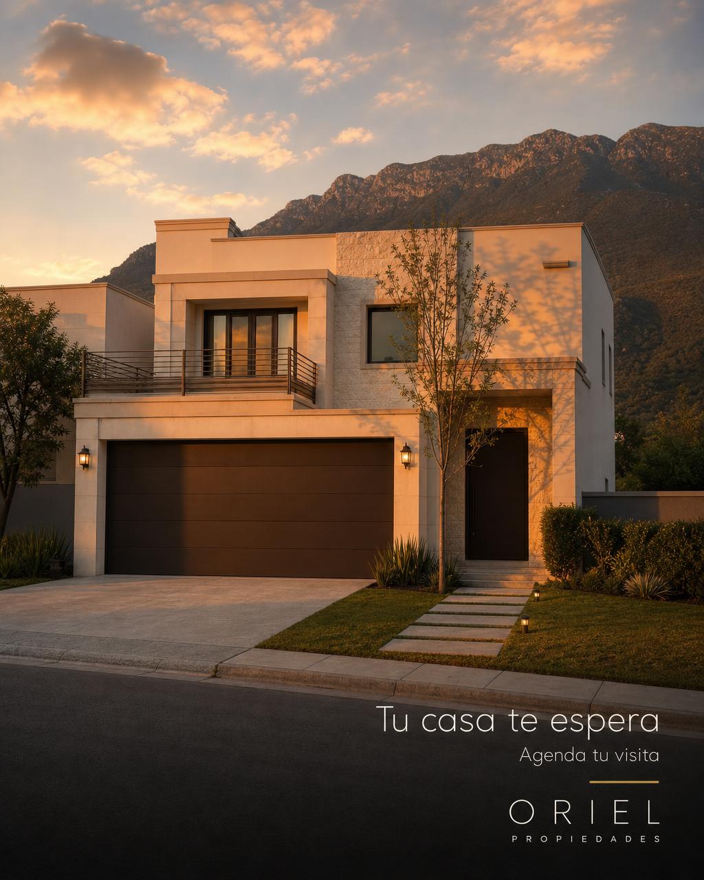 The house exterior seen from the street at golden hour